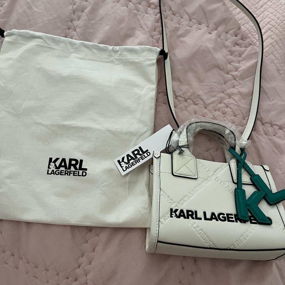 Gorgeous perfect for summer white KL embossed leather handbag.